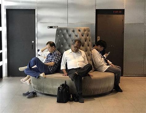 Hilarious Miserable Men Pictured While Waiting For Their