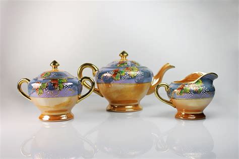 Antique Lusterware Tea Set Teapot Sugar Bowl And Creamer Made In Japan Leaf Raised Gold