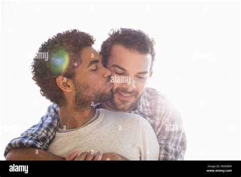 Happy Gay Couple Cuddling Stock Photo Alamy