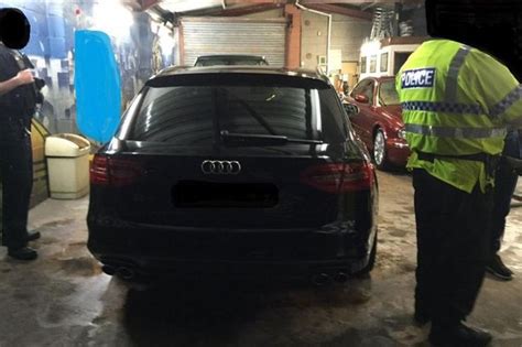Two Arrested After Stolen £40000 Audi Discovered In Private Garage