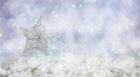 Silver Star On Christmas Snowy Bokeh Background Stock Image Image Of