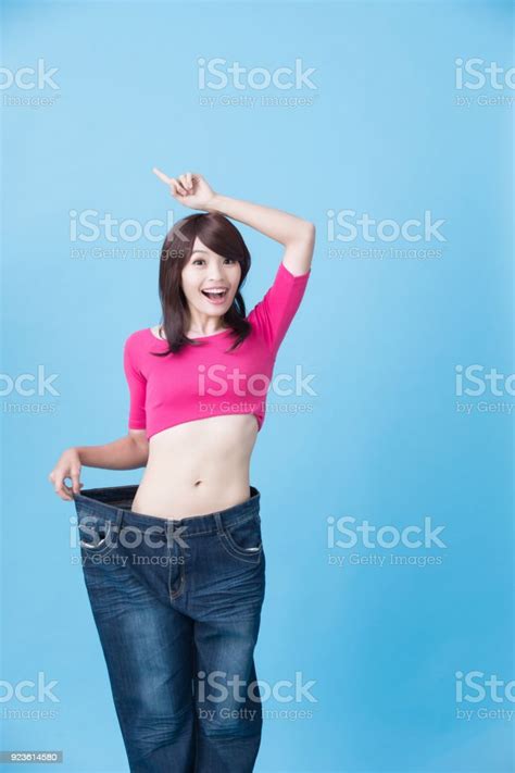 Woman Show Weight Loss Stock Photo Download Image Now Asia Asian