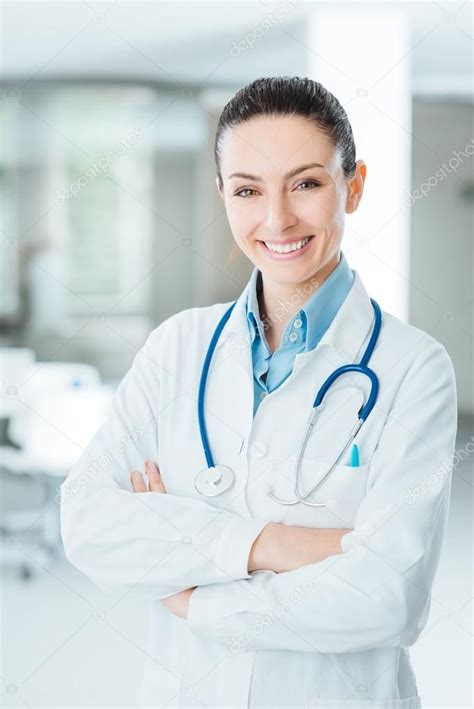 Confident Female Doctor Posing In Her Office Stock Photo Affiliate