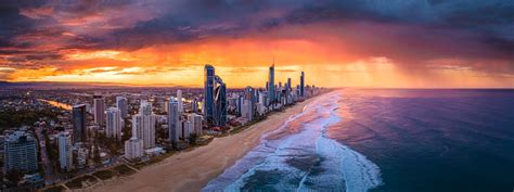 An Aerial View Of The Gold Coast In Australia At Sunset With Storm