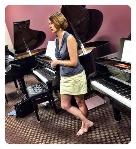 candid photos of a barefoot piano instructor the mousepad