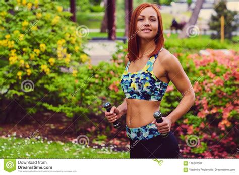 Portrait Of Redhead Fitness Female Holds Dumbbells Stock Image Image