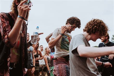 Free Photo Group Of Hippies Dancing At The Outdoor Festival