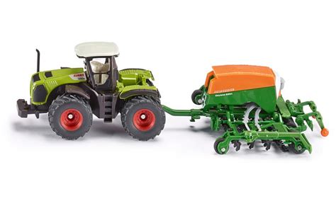 Claas is an agricultural machinery manufacturer founded in 1913, based in harsewinkel, germany in the region of north rhine westphalia. Siku 1826 CLAAS Xerion 5000 Tractor and Amazone Cayenna ...