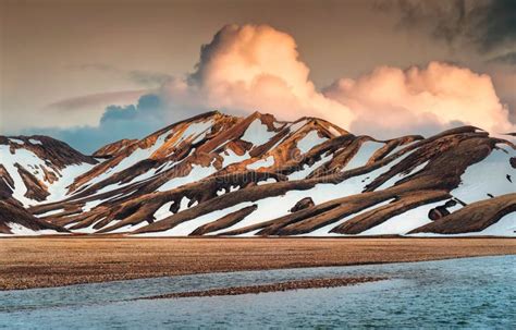Landscape Of Volcanic Mountain With Snow Covered And Sunset Sky Among