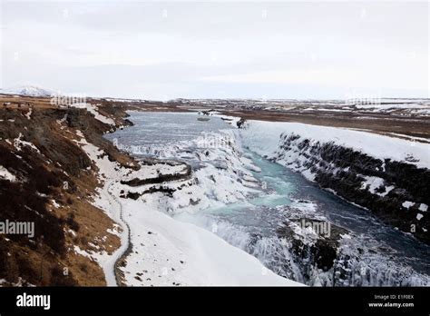 The River Hvita River Flows Through The Gullfoss Gorge And Over The