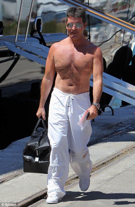 Nice Tanned Tum Simon Cowell Shame About The Moobs Daily Mail Online