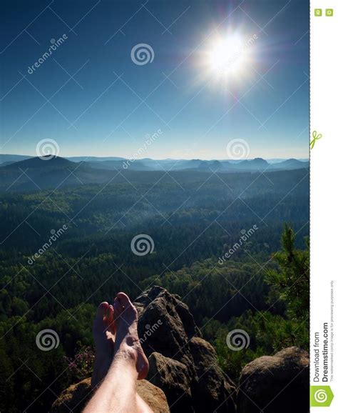 Naked Male Legs Take Rest On Peak Outdoor Activities