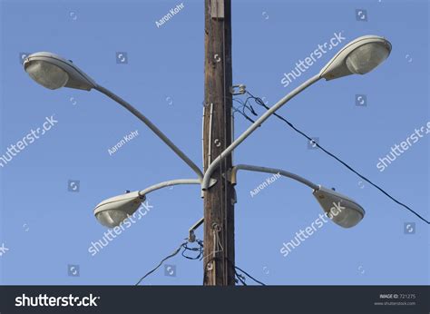 Four Street Lights On A Pole Stock Photo 721275 Shutterstock