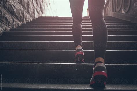 Woman Running Up The Stairs By Stocksy Contributor Lumina Stocksy