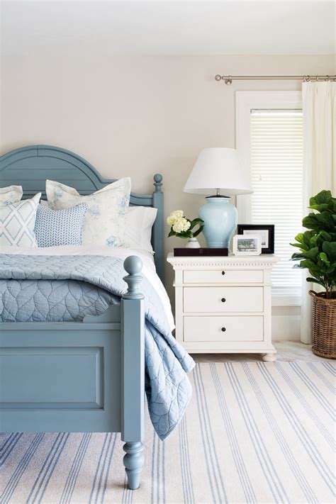 This coastal bedroom features vaulted ceiling, shiplap walls and a fresh color palette mixing greys, mossy greens with pale pink. Coastal Interior Design Ideas - Home Bunch Interior Design ...