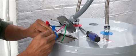 Once heated, hold the glue gun perpendicular to the twisted wires and squeeze a glob of glue onto them. How to Install an Electric Water Heater: Step-by-Step ...