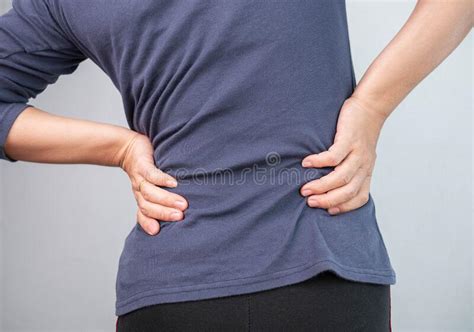 Woman Caught At The Waist And Her Back From Chronic Pain And Suffering