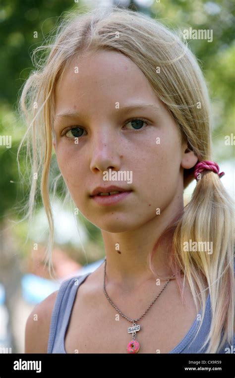 Portrait Headshot Of Cute Blonde Girl Teen Teenager Young Female Person Adolescent Schoolgirl