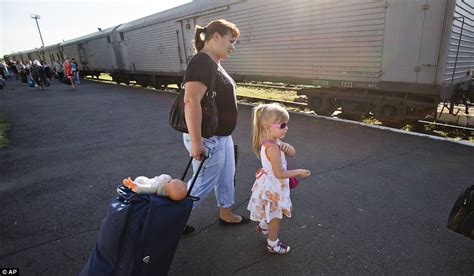 mh17 train carrying bodies of 282 crash victims sets off to morgue daily mail online