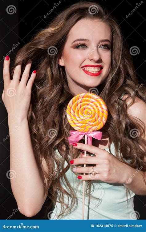 Beautiful Woman Eats A Big Candy Sweet Lollipop Stock Image Image Of Crazy Clothing 162314075