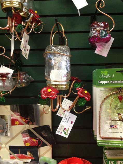Here are 9 different diy ideas for making some of these feeders as beautiful gifts for bird lovers! Hummingbird feeder made from a mason jar | Humming bird feeders, Christmas ornaments, Craft night