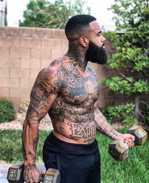 handsome black man with tattoos
