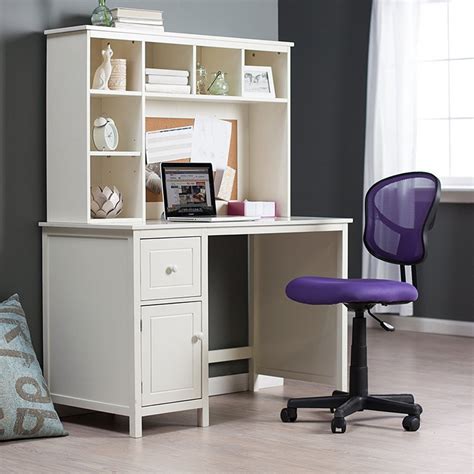 An adorable classy secretary desk with low slanted hutch of wooden materials in mid browns. Small flat or house - Buying small space desks is the ...