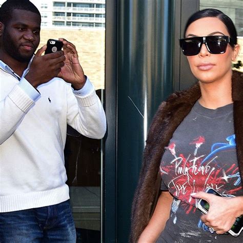 Kim Kardashian Rocks A Gucci Pantsuit Without A Top In La Kim