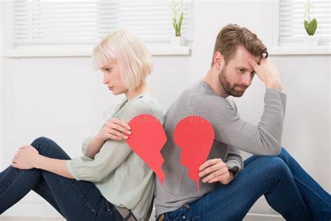 Sad Couple Holding Red Broken Heart Stock Image Image Of Angry