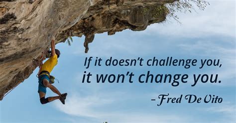 A Man Climbing Up The Side Of A Cliff With A Quote From Frid De Wito