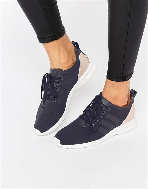 Suited for all types of workouts, these black boost your performance level with any of these black boots for women and show your feminine skills to the world. adidas Originals ZX Flux Smooth Black & Gold Trainers at asos.com | Adidas shoes women, Black ...