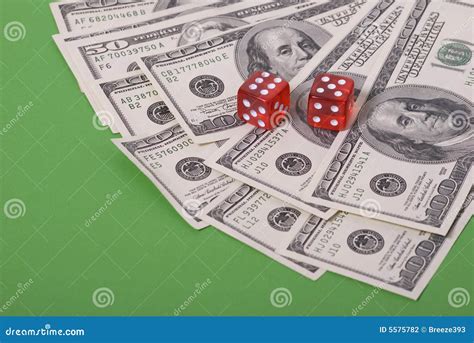 Money And Dice Stock Photography Image 5575782