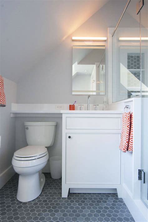 Admittedly, part of the reason most attics aren't finished in the first place is that the sloped ceilings make them, at best, problematic as living spaces. Gray and Orange Bathrooms, Contemporary, Bathroom. Attic ...