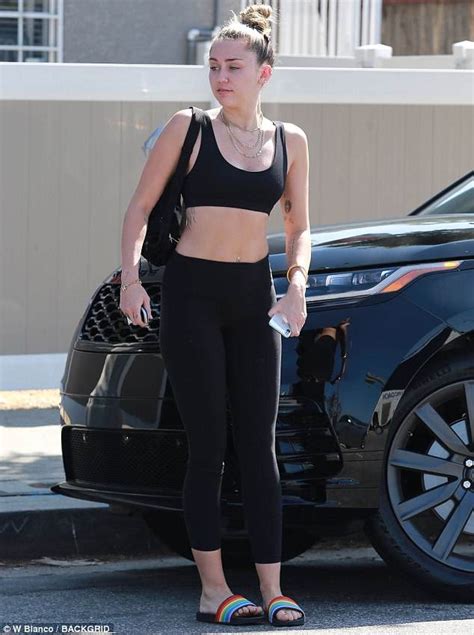 Miley Cyrus Flaunts Her Toned Tummy In A Sports Bra And Yoga Pants