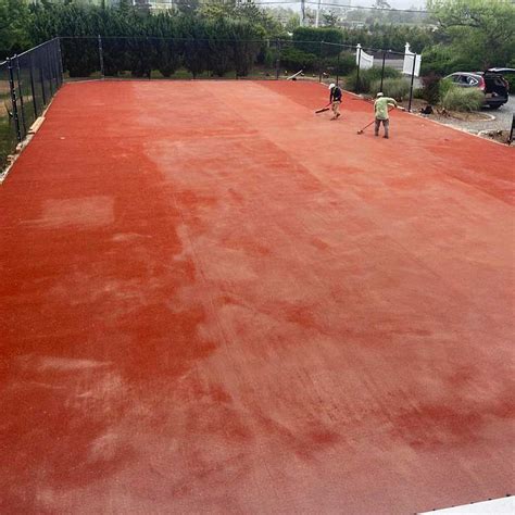 Unrolling Caliclay Turf On Tennis Court For Red Clay Tennis Court Inst