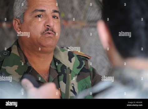 An Iraqi Army Officer Speaks Through An Interpreter To Us Army 1st Lt Bryan Gerhart Of B