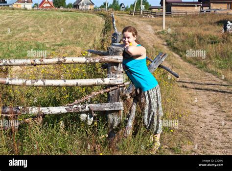One Young Caucasian Russian Woman Near Village Fence Villager Russia