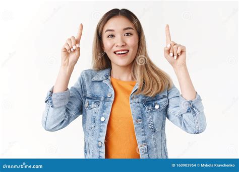 Friendly Happy Good Looking Blond Asian Girl Discuss Interesting Promo Raise Hands Up Index