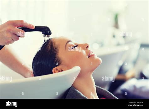 Happy Young Woman At Hair Salon Stock Photo Alamy