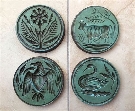 set of 4 vintage sexton cast metal round wall plaque hangings 6 diameter cow eagle swan