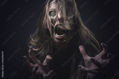 Crazy Deranged Woman Pulling Her Hair Out Scary And Insane Halloween Concept Possessed By