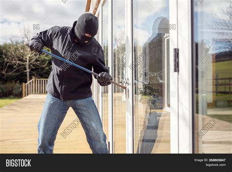 Burglar Thief Breaking Image And Photo Free Trial Bigstock
