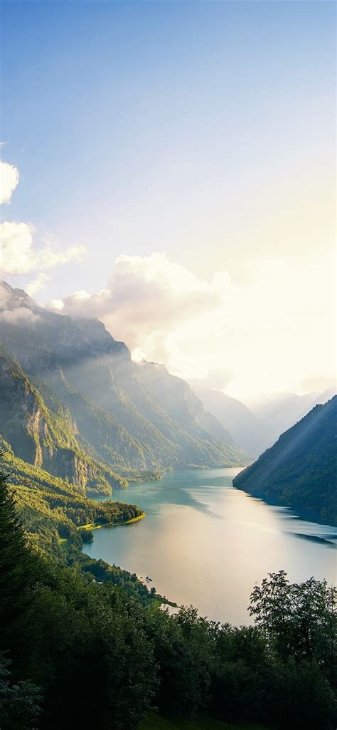 Mountains River Fjord Sun Rays Beautiful Nature Landscape 828x1792