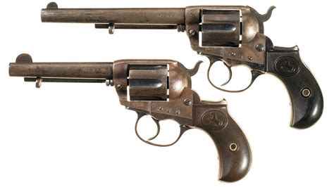 Two Colt Model 1877 Da Revolvers W Cases Rock Island Auction