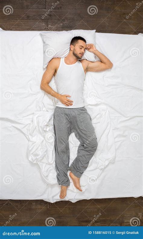 Young Man Relaxation On The Bed Top View Sleeping Stock Image Image