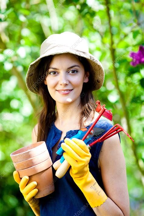 woman gardening stock image c031 3600 science photo library