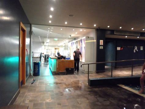 To provide additional protection to both the staff operating. Glass partition between pool & reception desk - Picture of ...