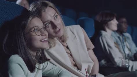 mother and daughter watching film together stock video envato elements