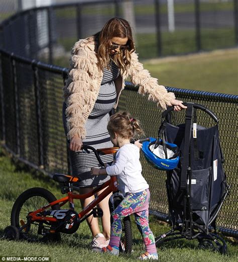 pregnant rebecca judd gets a helping hand from daughter billie at the park daily mail online