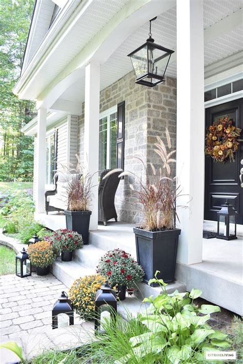 An Elegant Front Porch Decorated For Fall